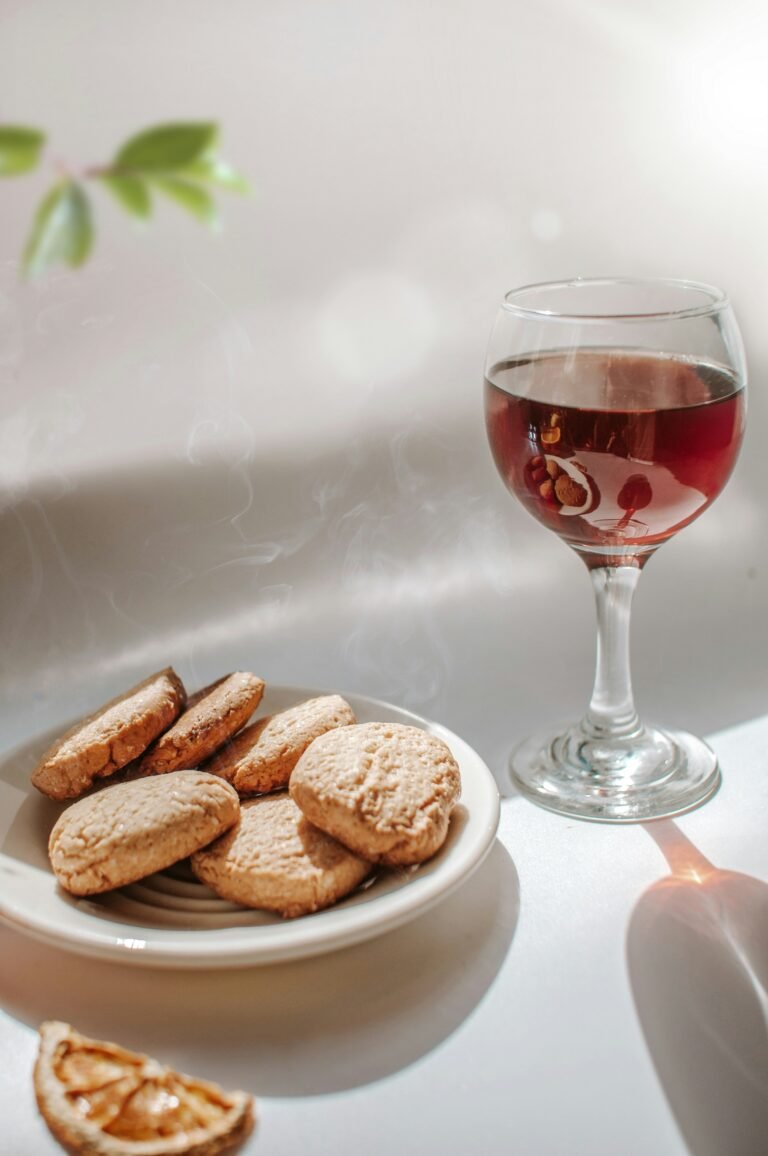 A glass of luscious sweet wine accompanied by a plate of biscotti, a delectable pairing perfect for indulgent moments. Embrace the sweet symphony of flavors and the comfort of delightful treats. #SweetWine #BiscottiPairing #Indulgence