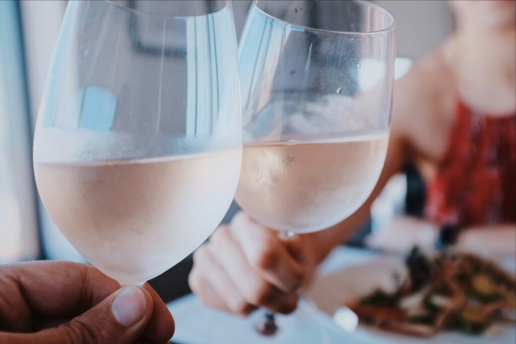Two glasses of refreshing rosé wine, perfect for summer soirées and leisurely evenings. Embrace the blush of elegance and indulge in the delicate flavors. #RoséWine #SummerSips #WineCulture