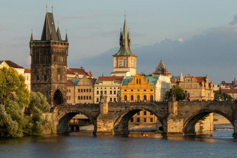 Scenic view of Charles Bridge and historic towers in Prague, Czech Republic.