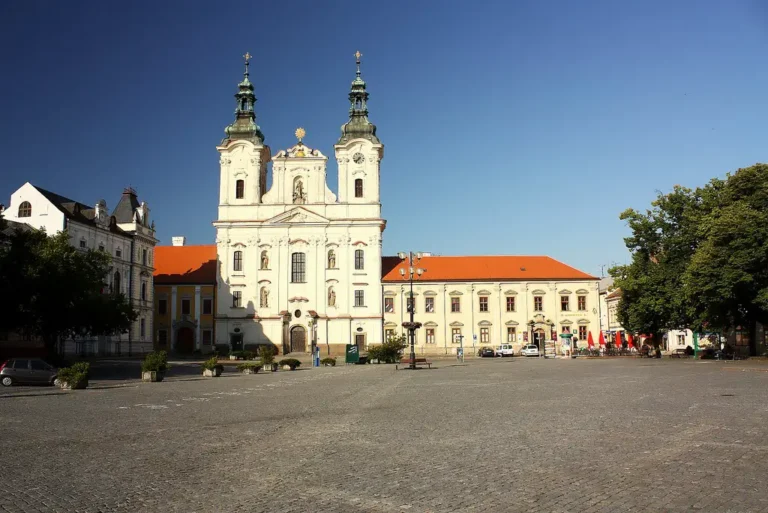 Historical Baroque Church in a Sunny Town Square in Slovakia